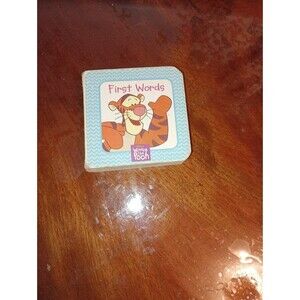 Winnie the Pooh First Words Board Book with Tigger
